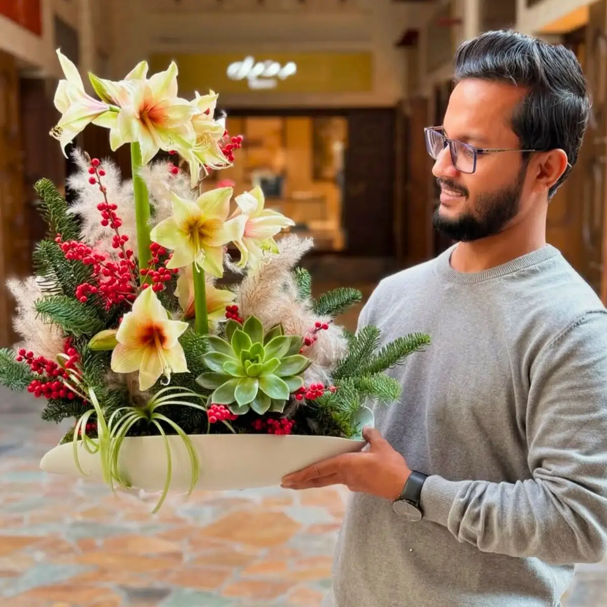 Kazi with bunch of Amaryllis for Christmas