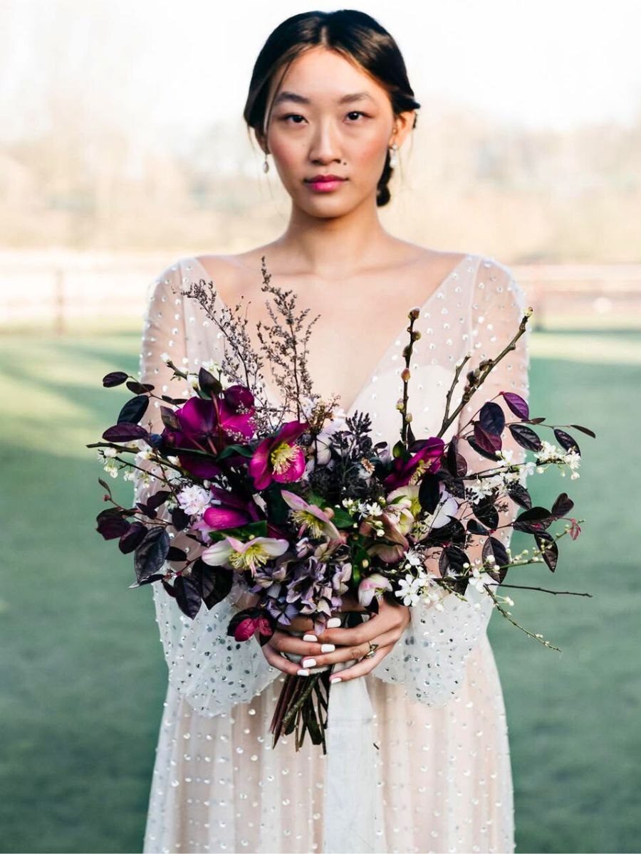 Girl with a helleborus winter arrangement