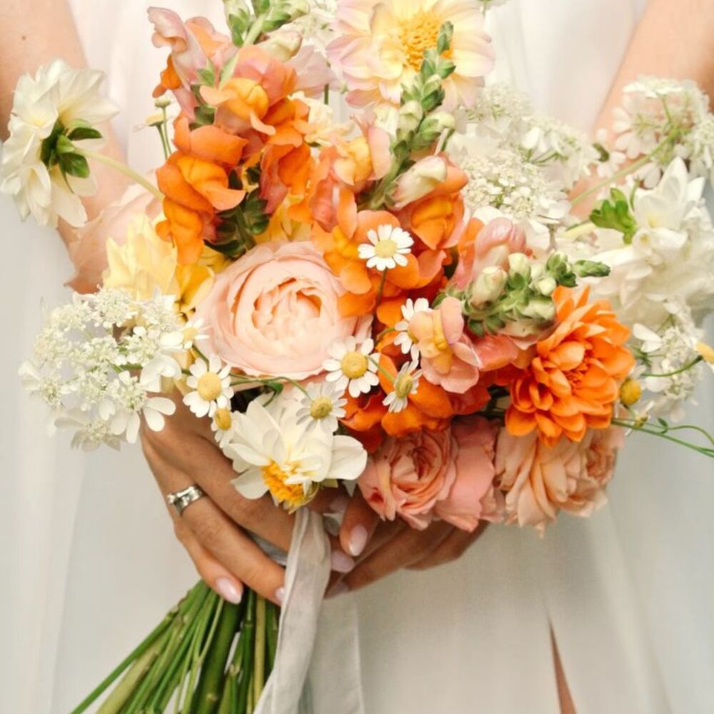 Lush orange and peach bridal bouquet