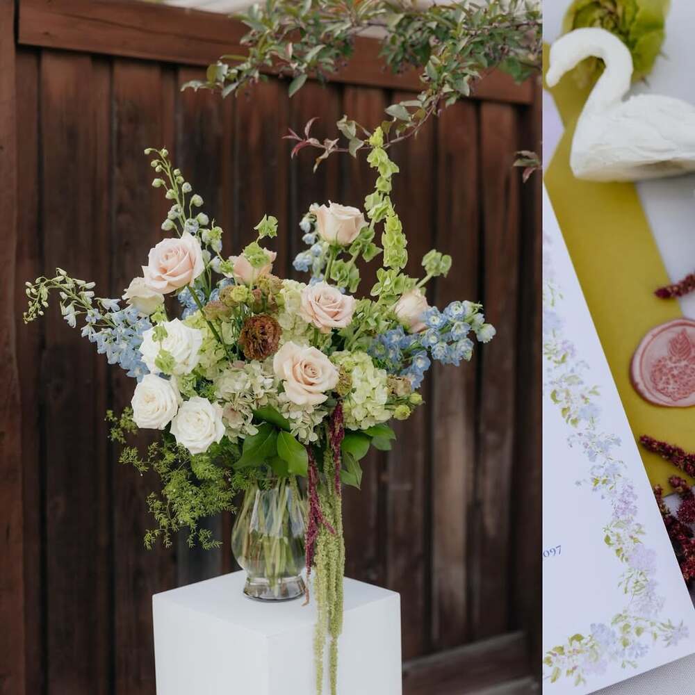 Tall pastel wedding centerpiece with roses