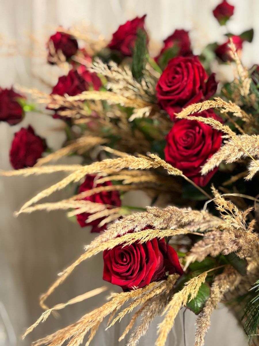 Christmas design using Red Naomi roses