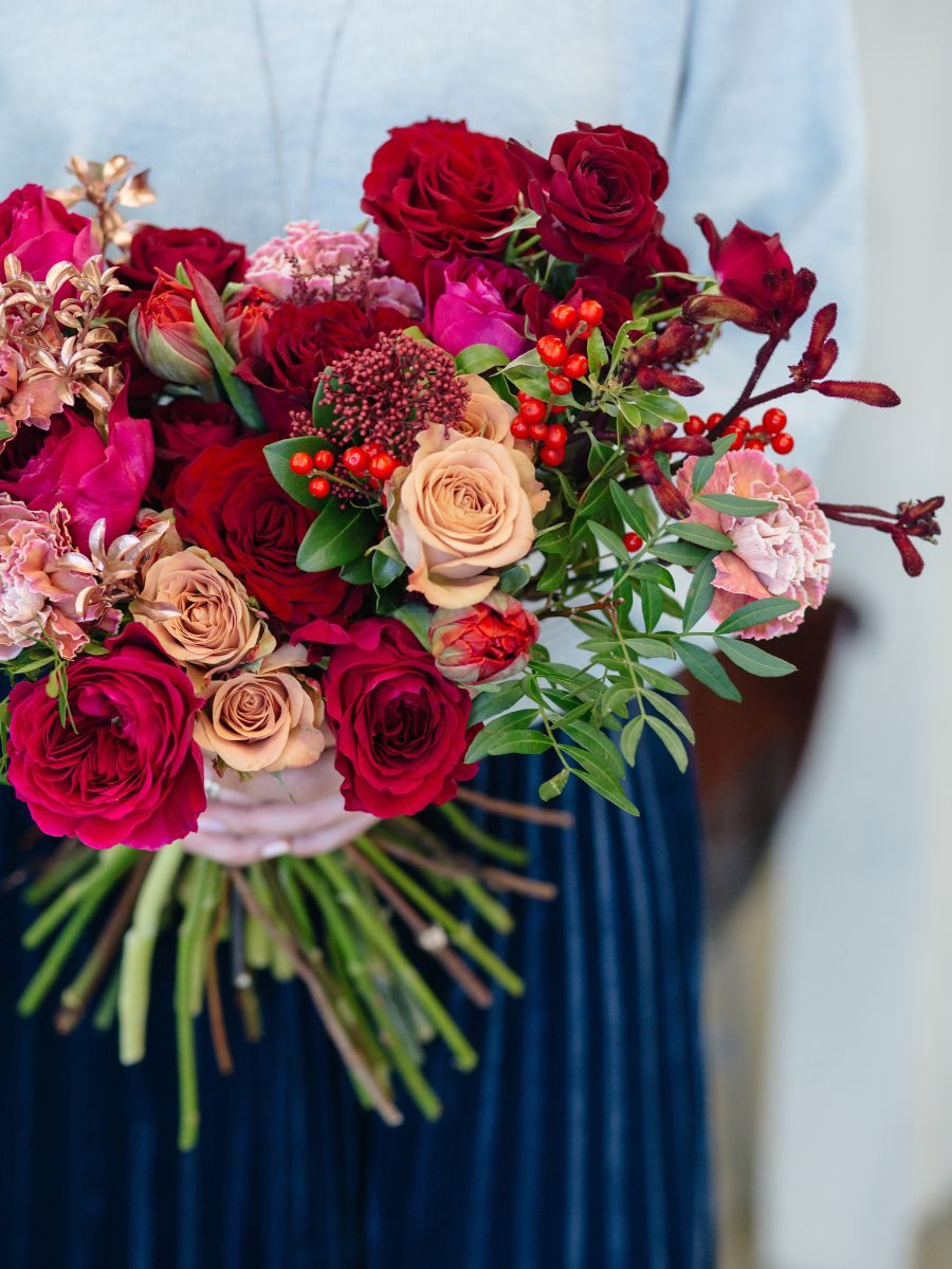 Design with red roses by Alexandra Farms