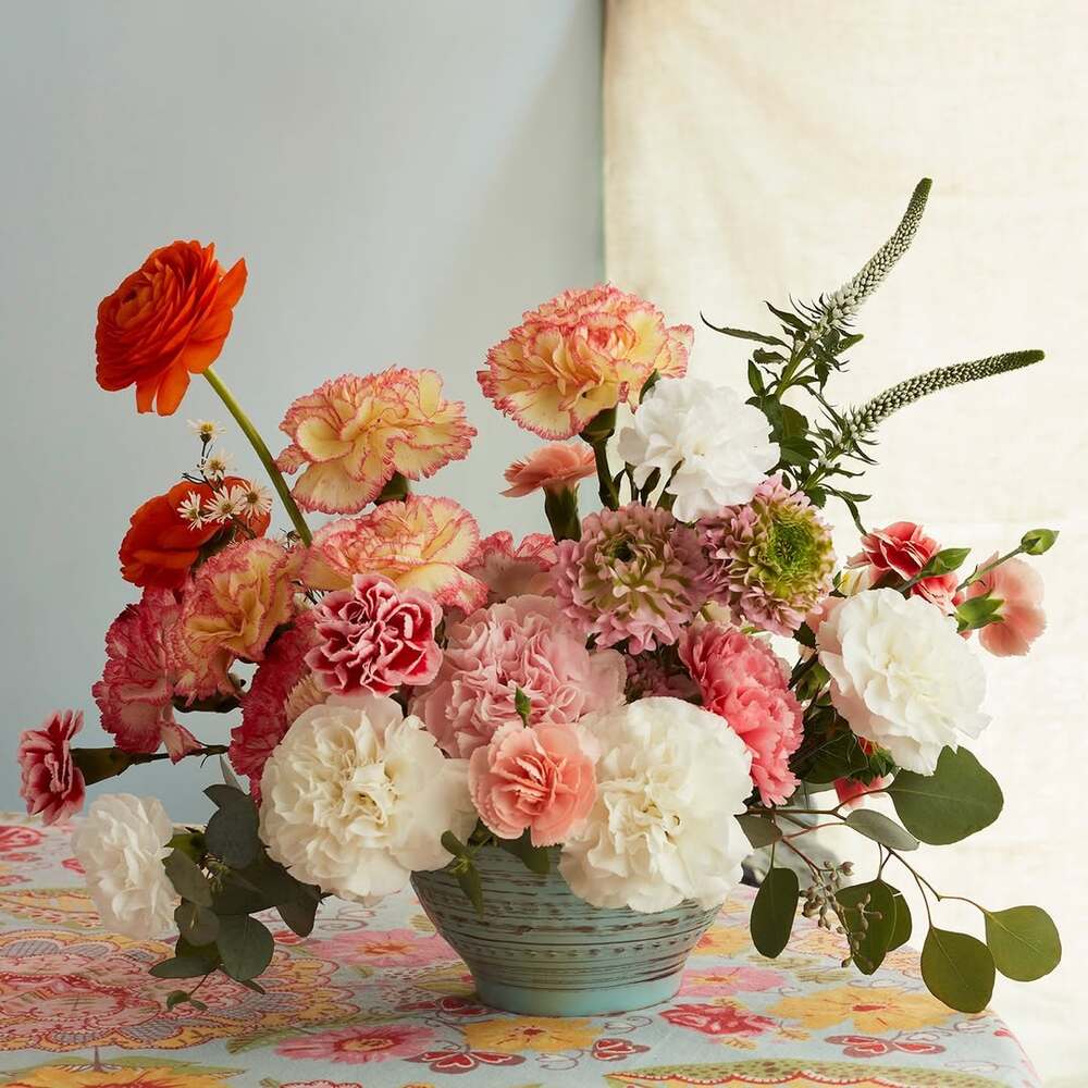 Colorful carnation and ranunculus arrangement