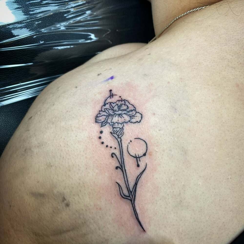 Minimalist geometric carnation flower tattoo