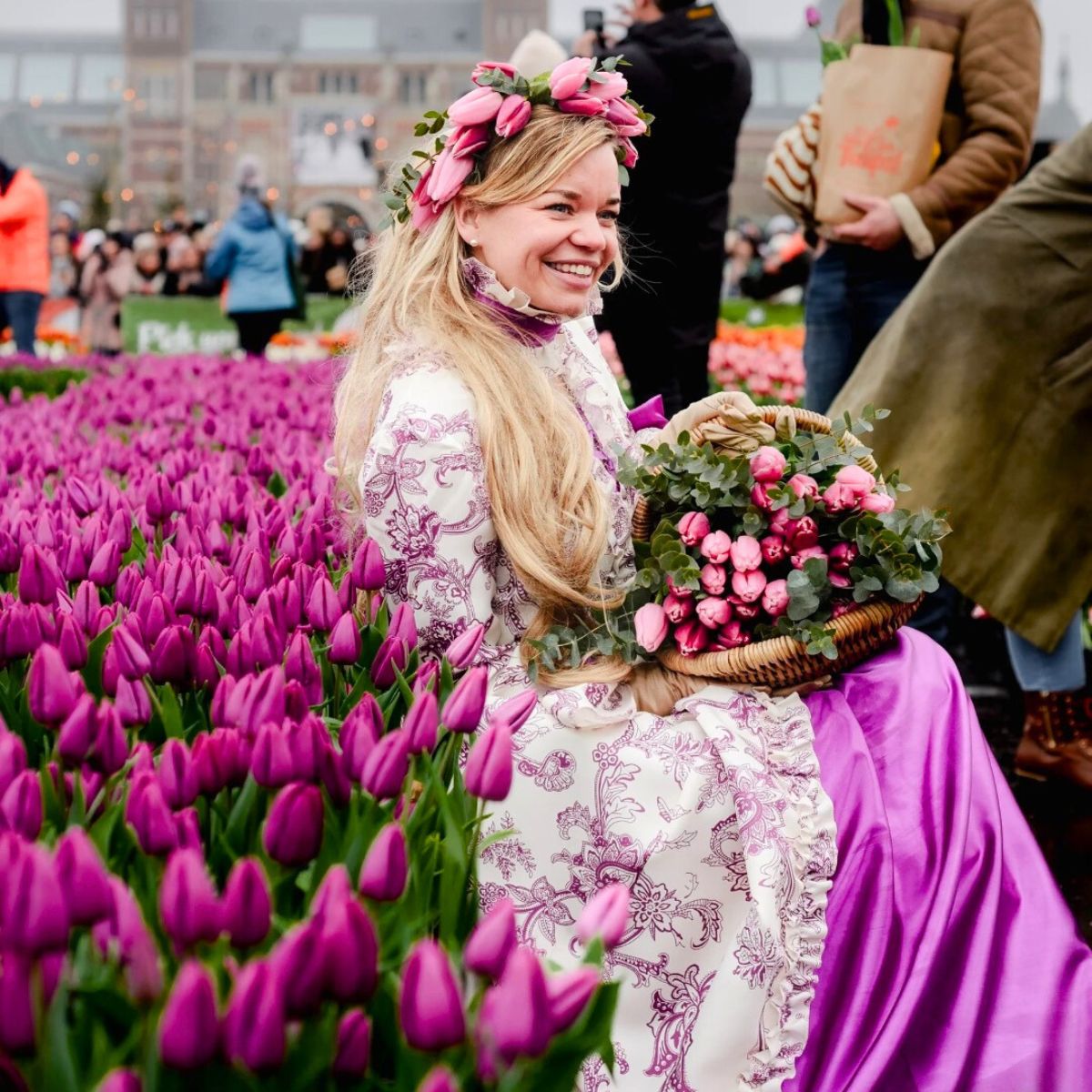 Woman with pink tulips