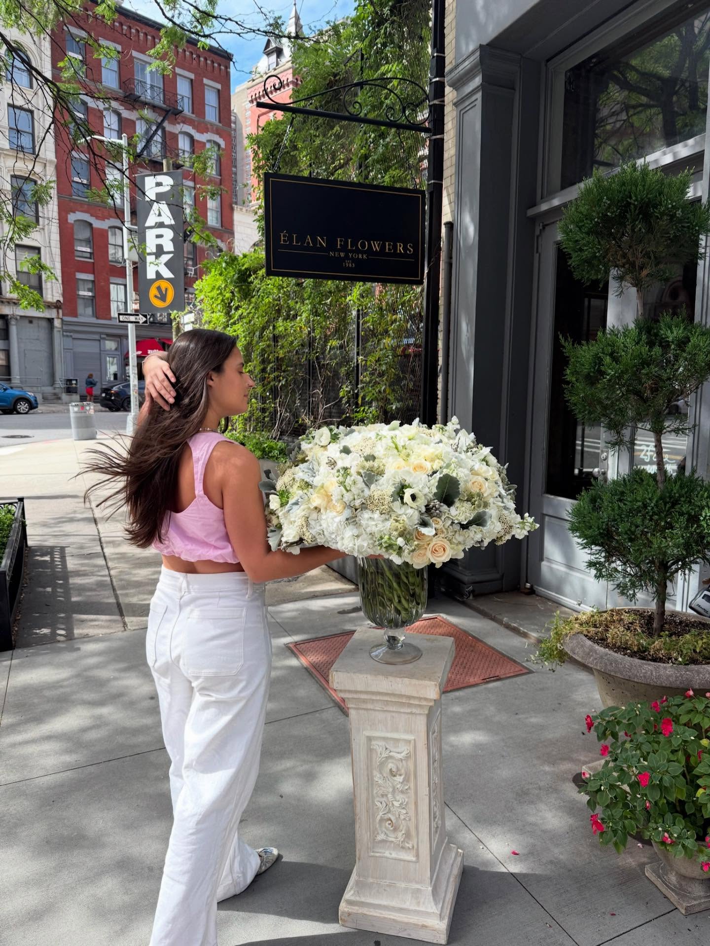 Dusty Whites palette floral arrangement in the Tr&egrave;s &Eacute;lan size - clicked outside the shop - Elan Flowers