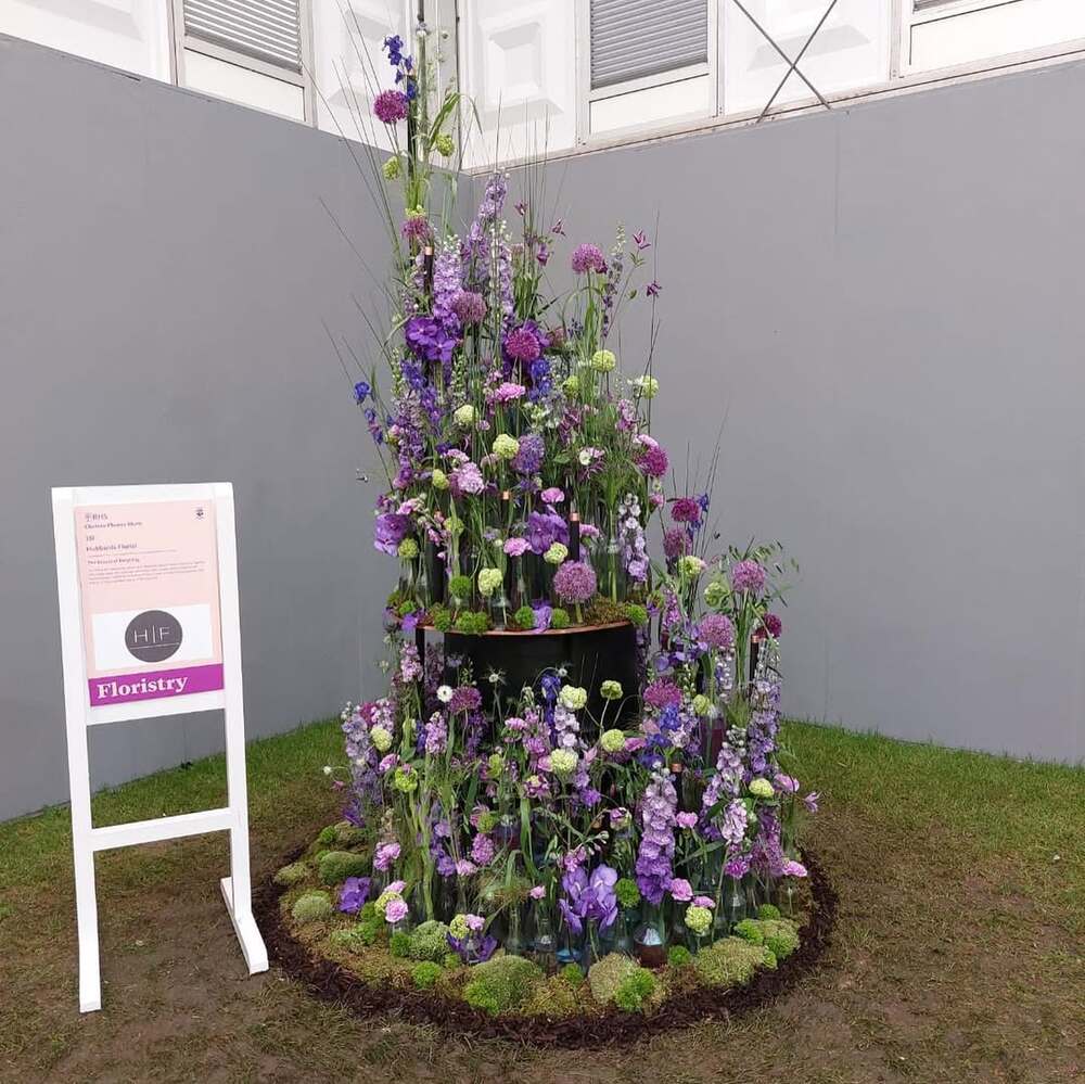  Tall purple floral display outdoors