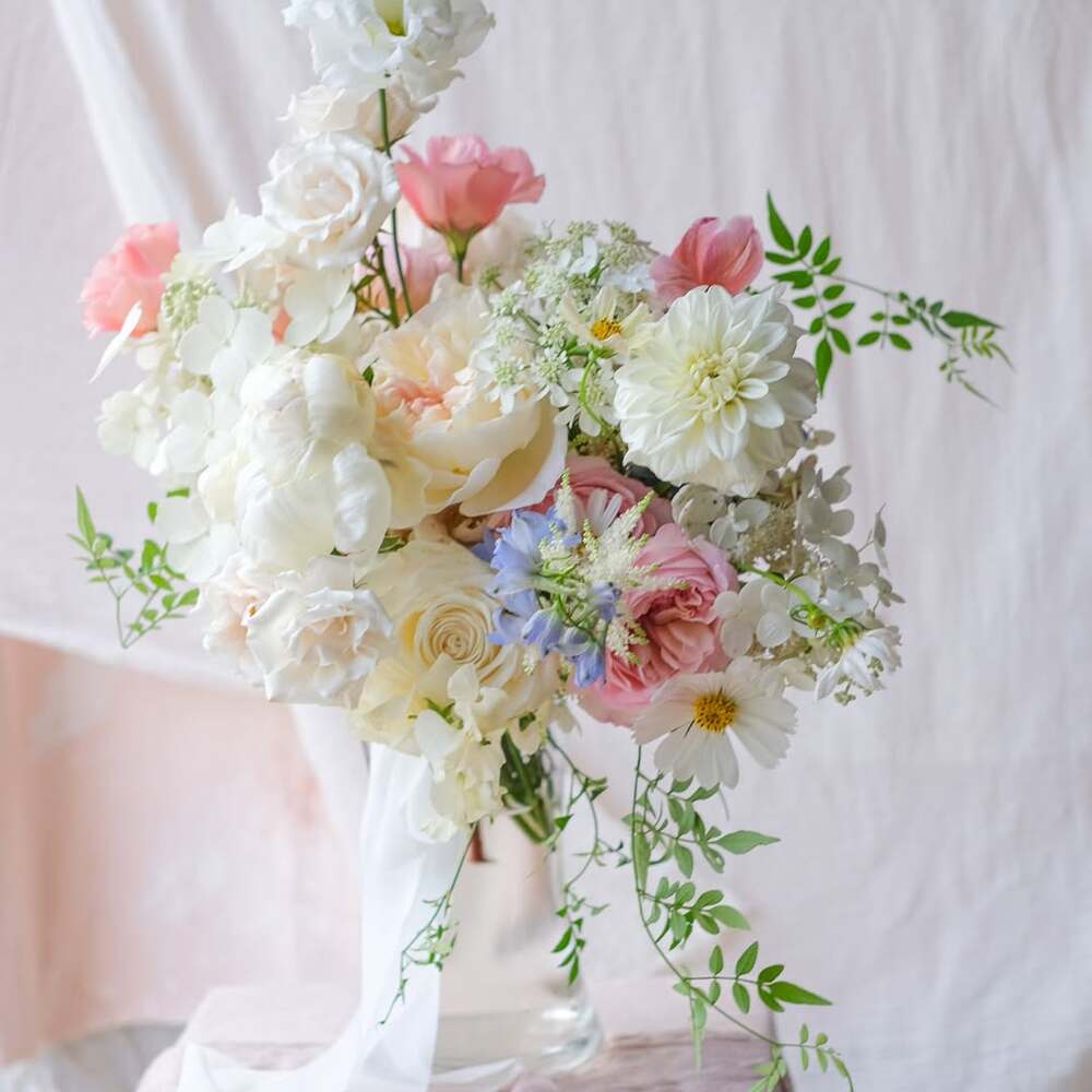 Whimsical bridal bouquet with pastels