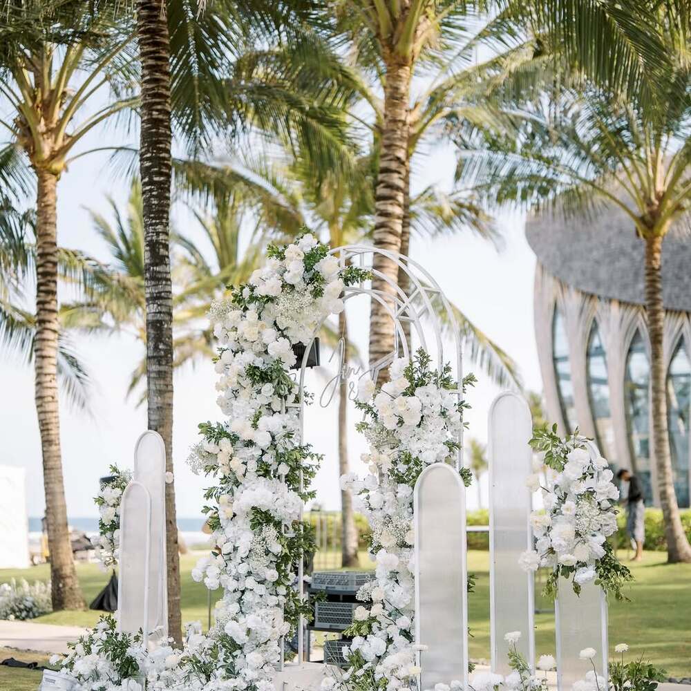 White floral arch for garden elopement