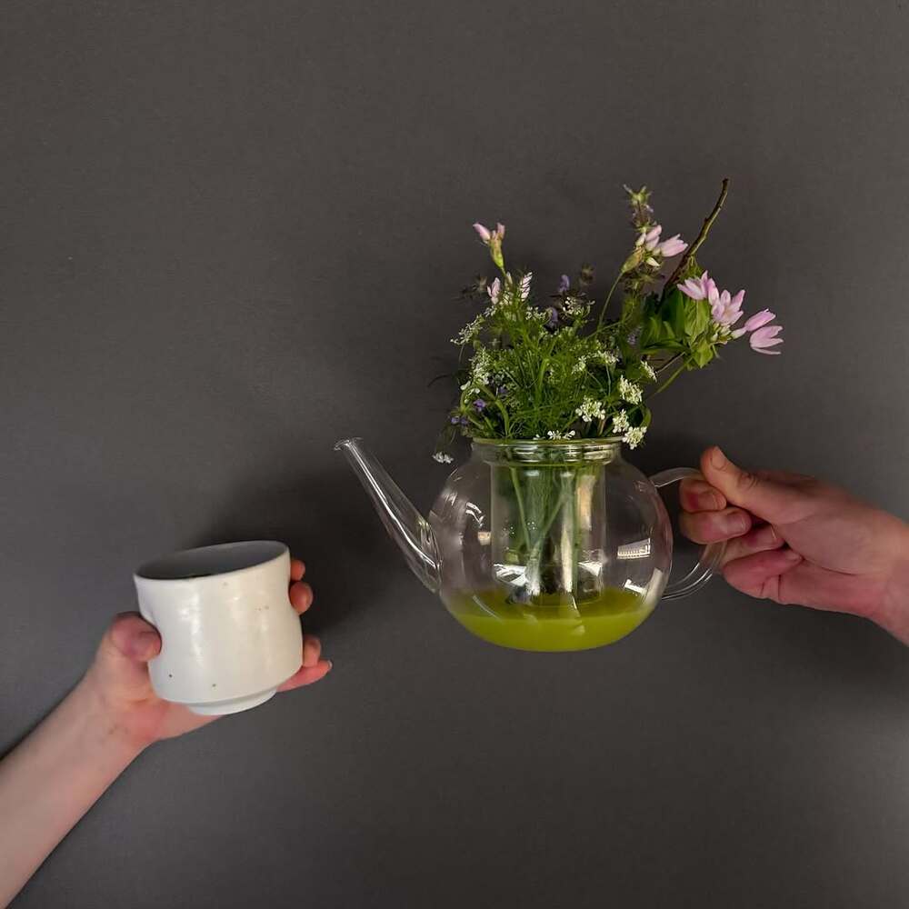 Teapot with fresh botanical bouquet