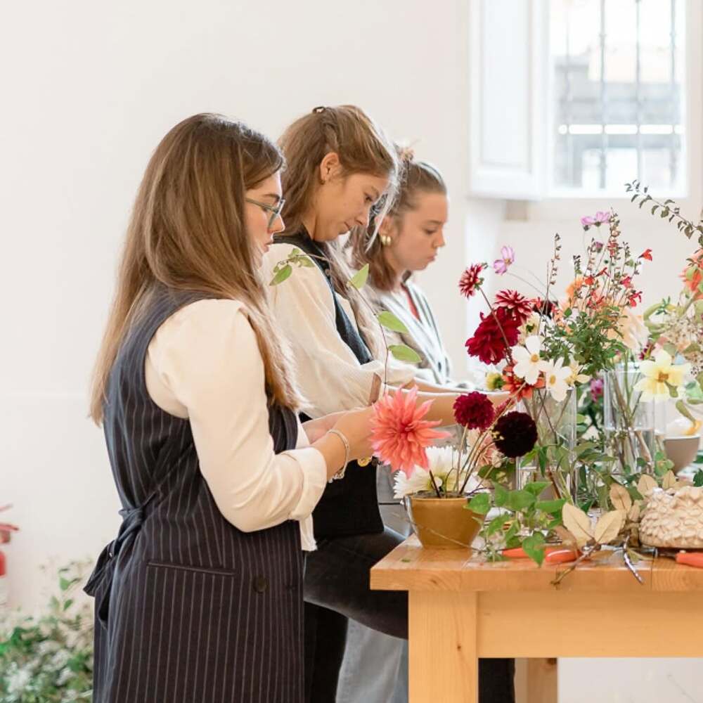 Students arranging flowers in workshop