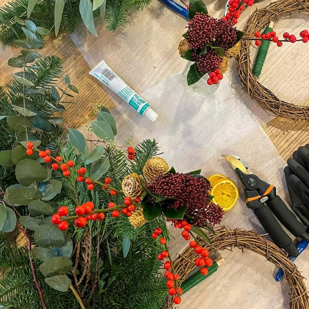 Floristry tools and winter greenery