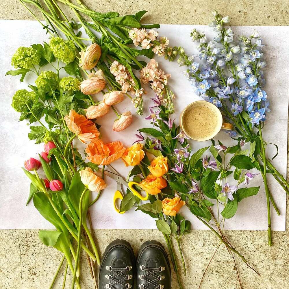 Flowers, scissors, coffee, and boots