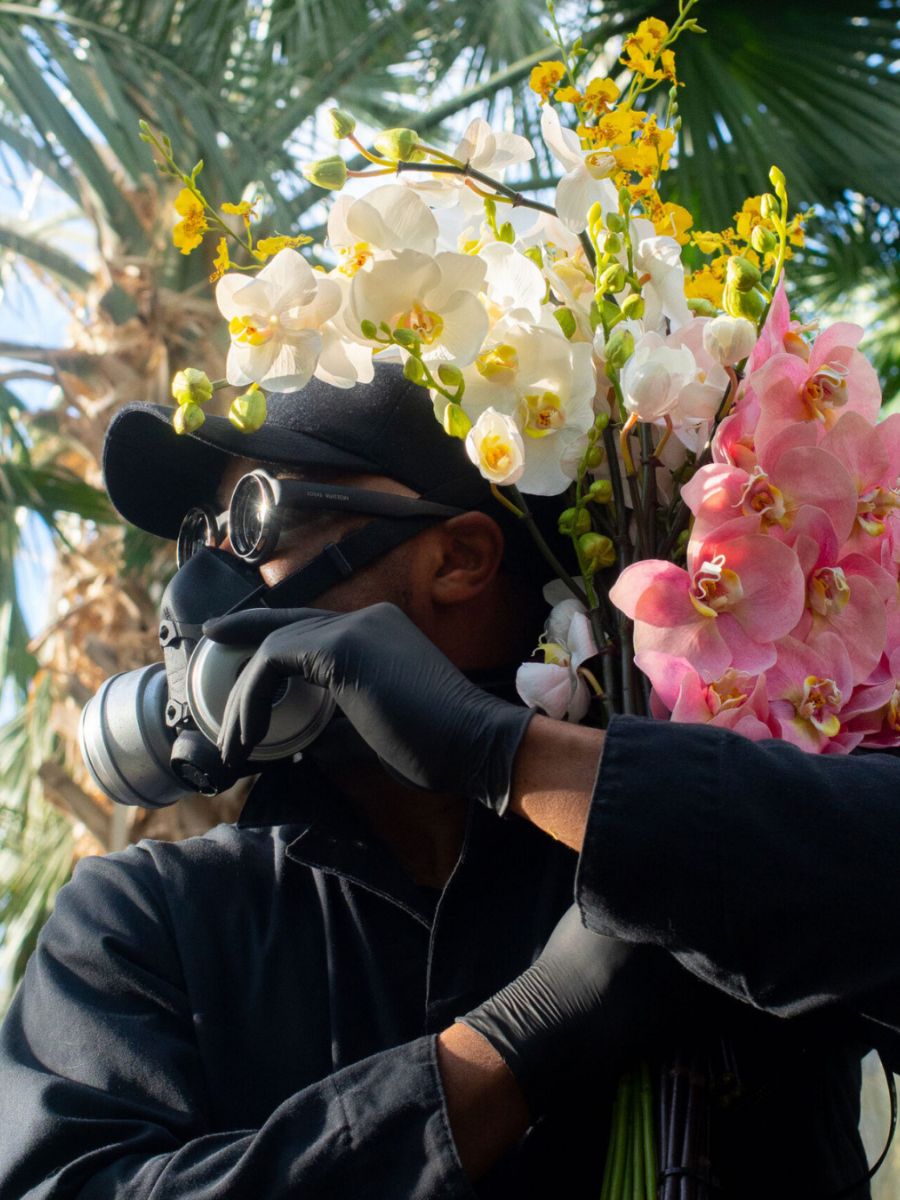 Mr Flower Fantastic carrying a bunch of orchids Mr Flower Fantastic carrying a bunch of orchids