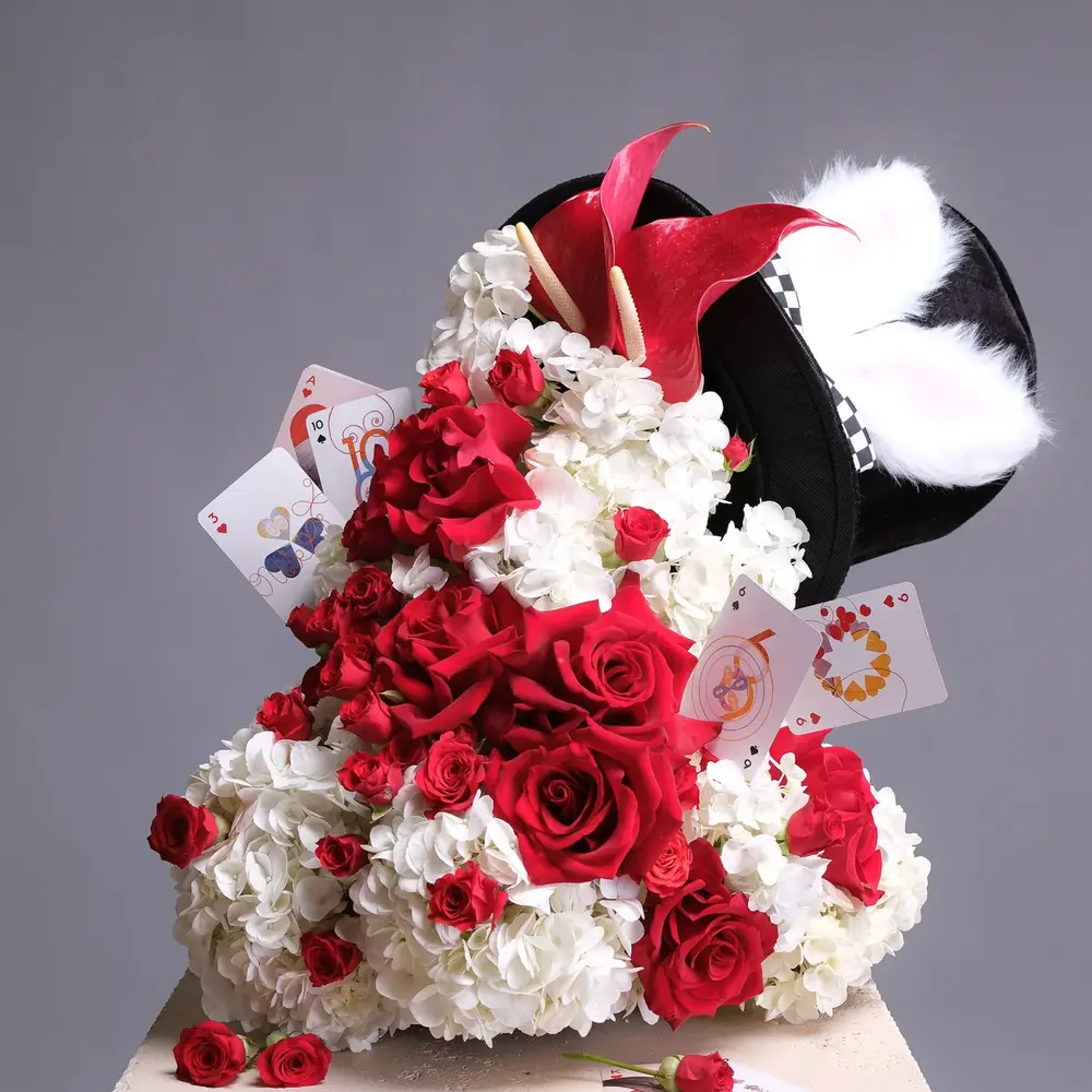 Alice in Wonderland themed floral arrangement Alice in Wonderland themed floral arrangement