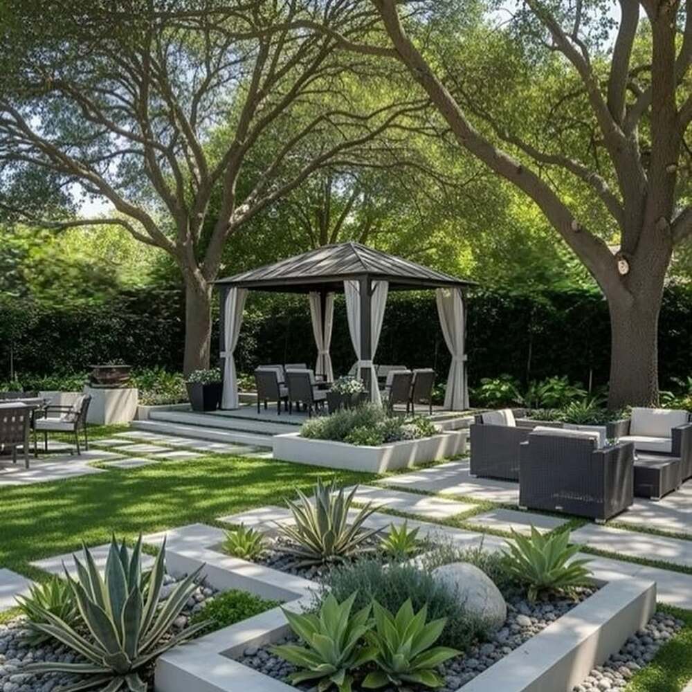 Modern backyard with interlock and gazebo