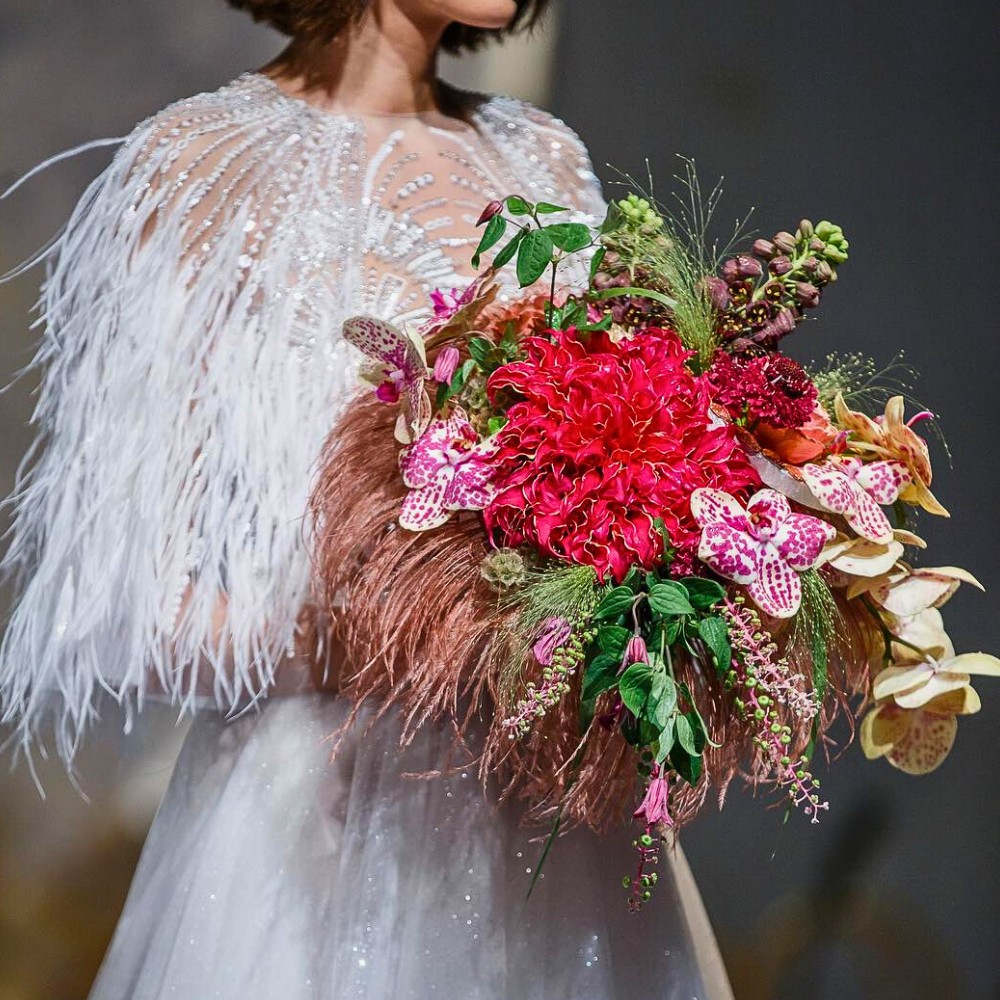 Bridal bouquet featuring different and popular flowers - design by Robert Koene