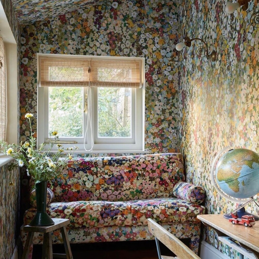 Floral sofa matching floral wallpaper