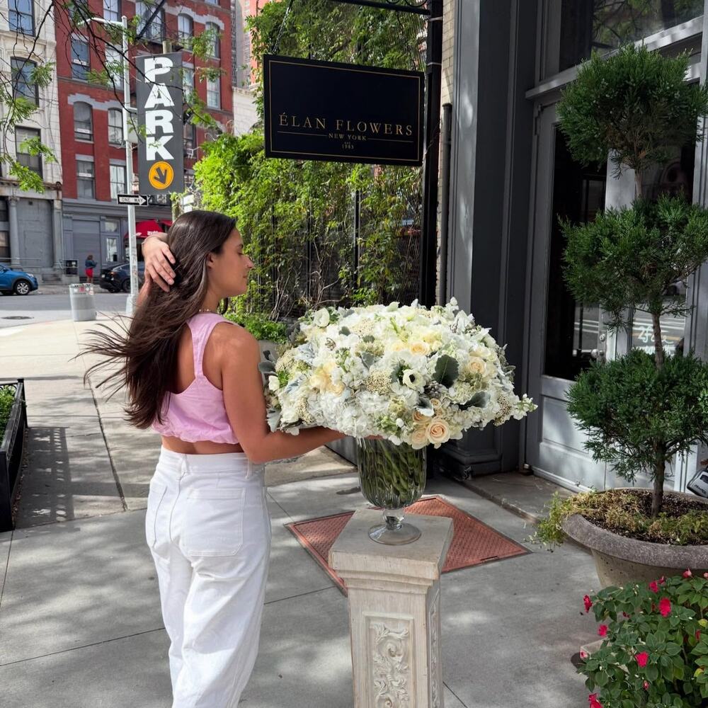 Dusty Whites palette floral arrangement in the Tr&egrave;s &Eacute;lan size - clicked outside the shop - Elan Flowers
