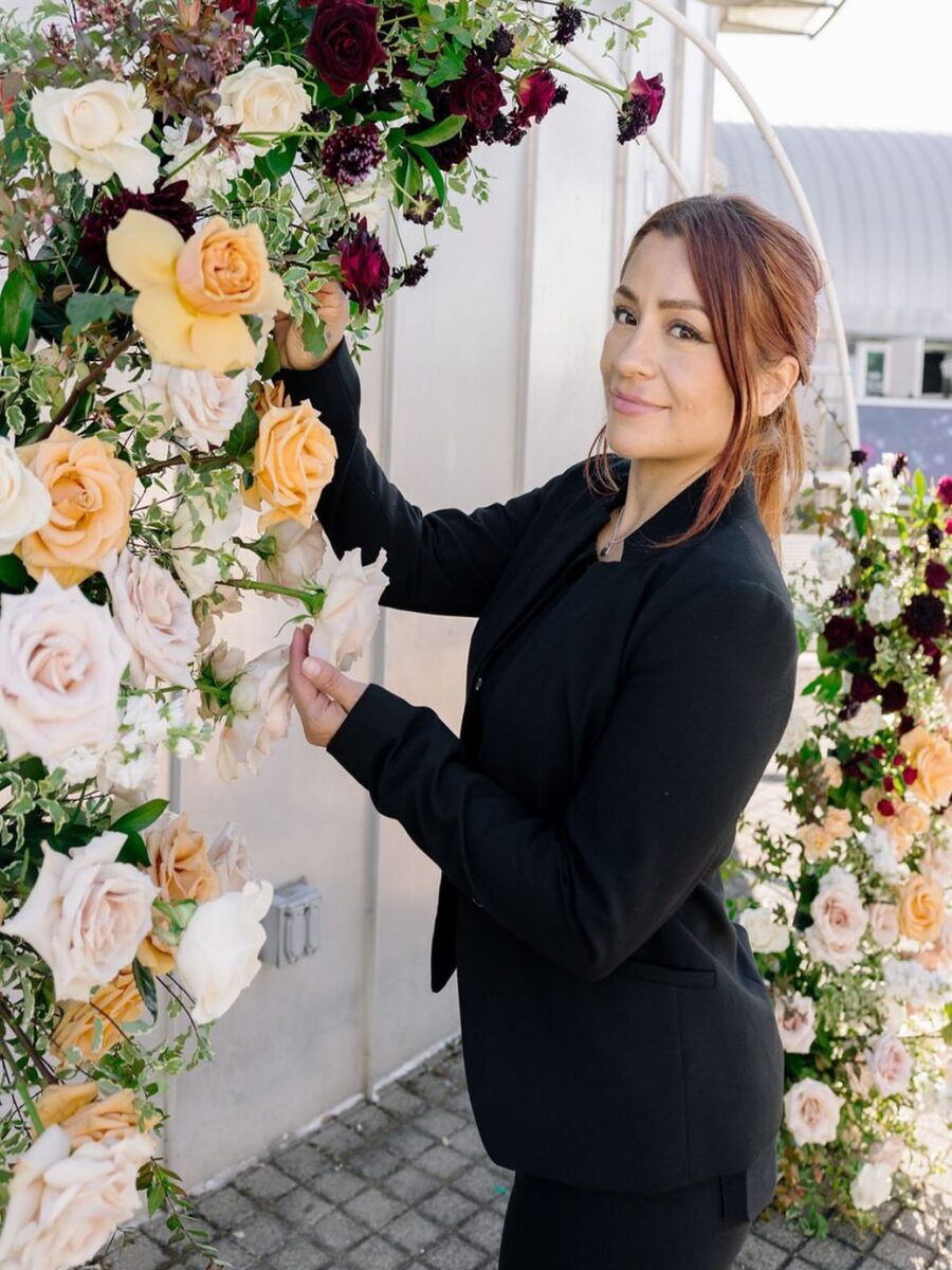 Women florist work on wedding flower decor