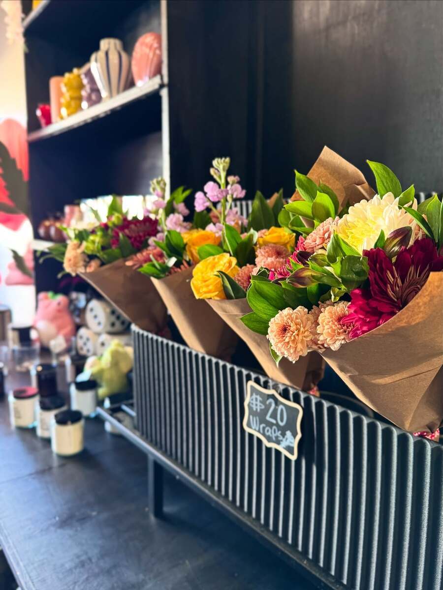 Showing bouquet in flower shop with price tag