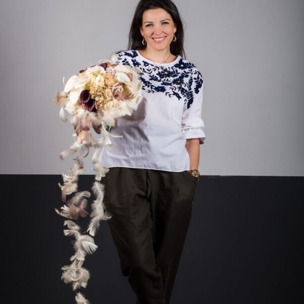 Studio Flores - Kristina Rimiene with bouquet - COVID-19 article on Thursd HIghlight