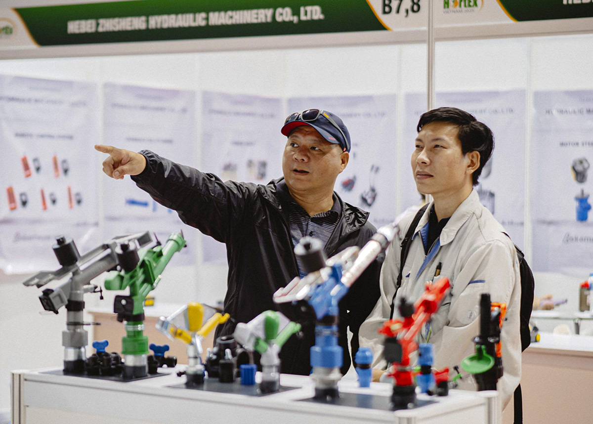 HortEx Thailand 2026 invitation two men technical machinery