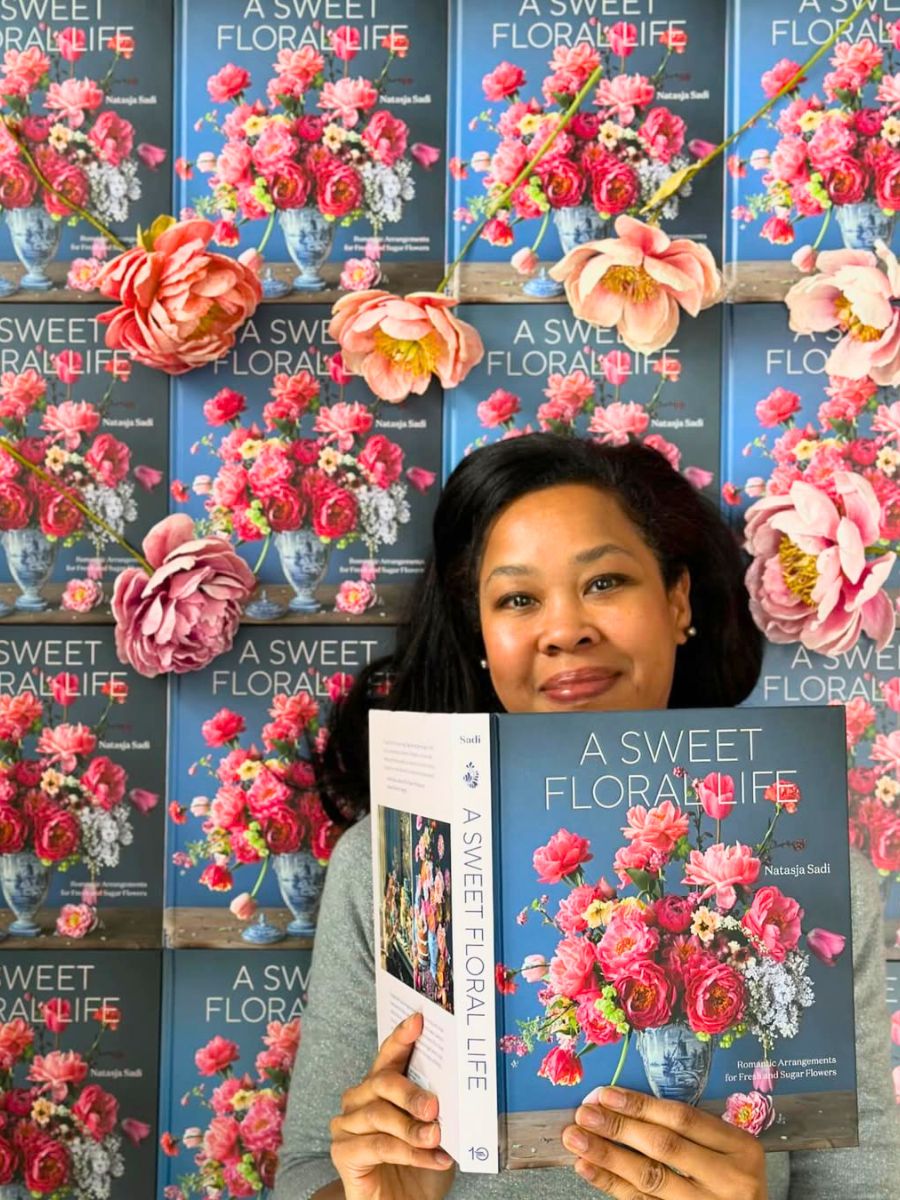 Natasja Sadi with her book