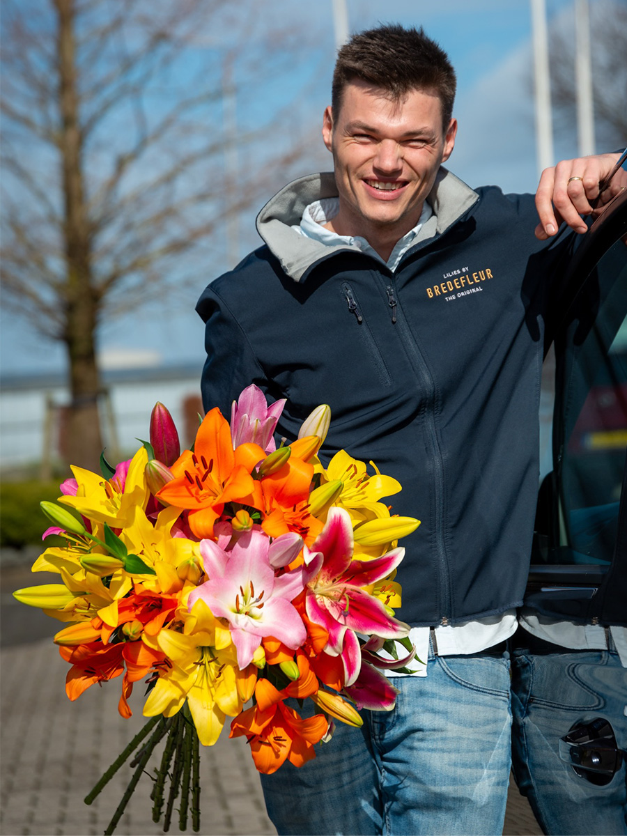 Levi Evers with colorful bunch Bredefleur lilies
