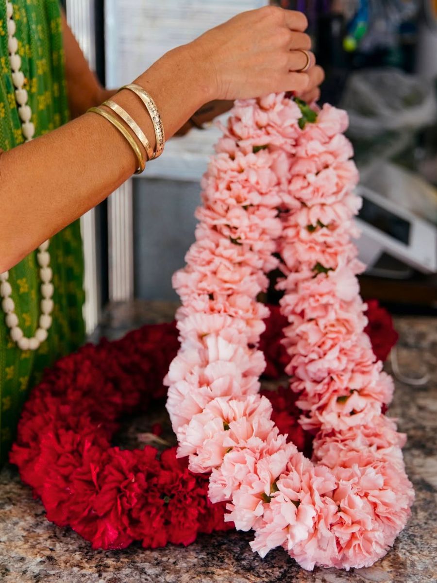 Two carnation lei pieces