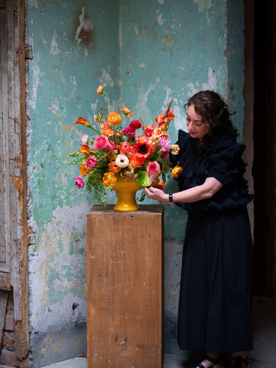 Tulipina with a floral arrangement