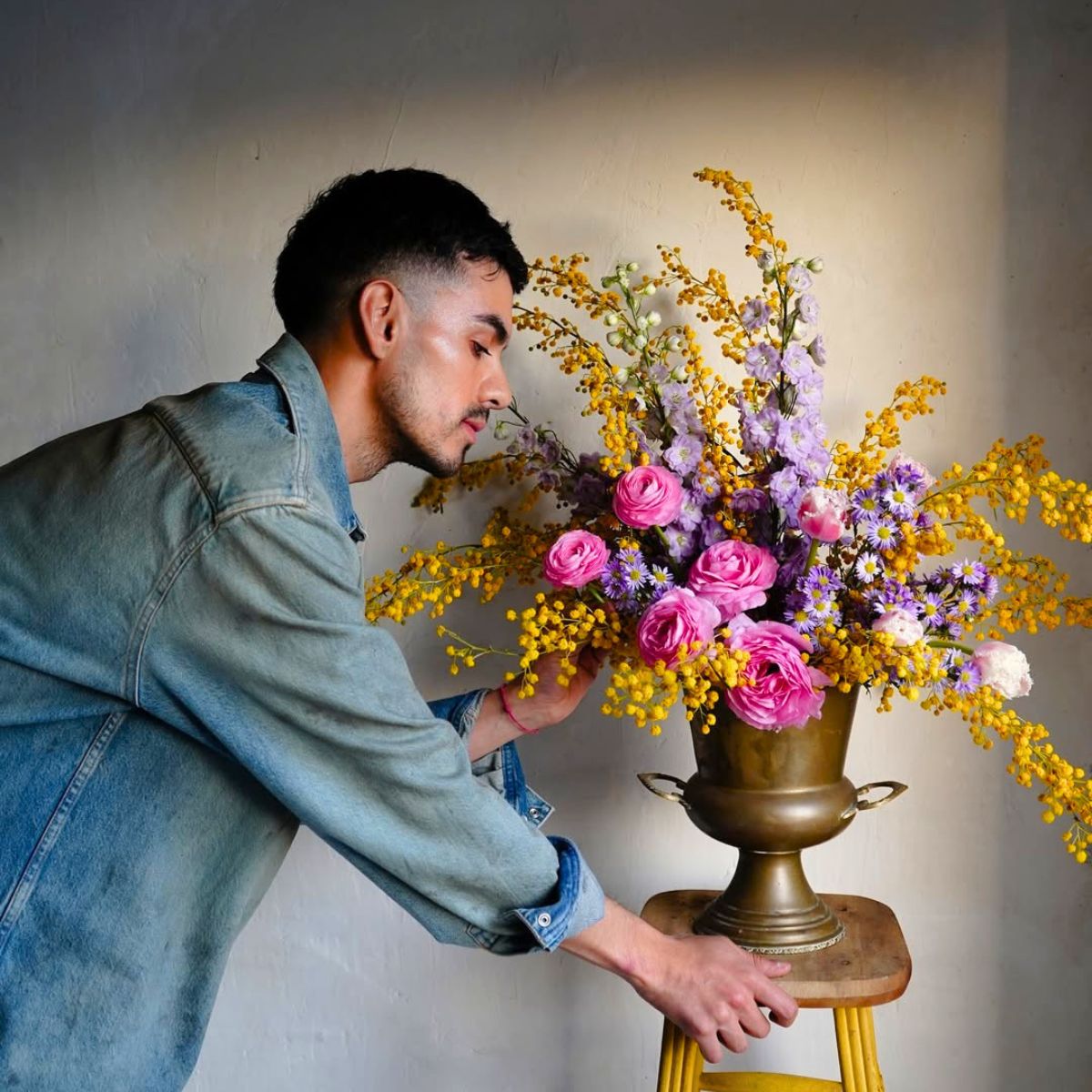 Andrew Ruiz with a floral arrangement