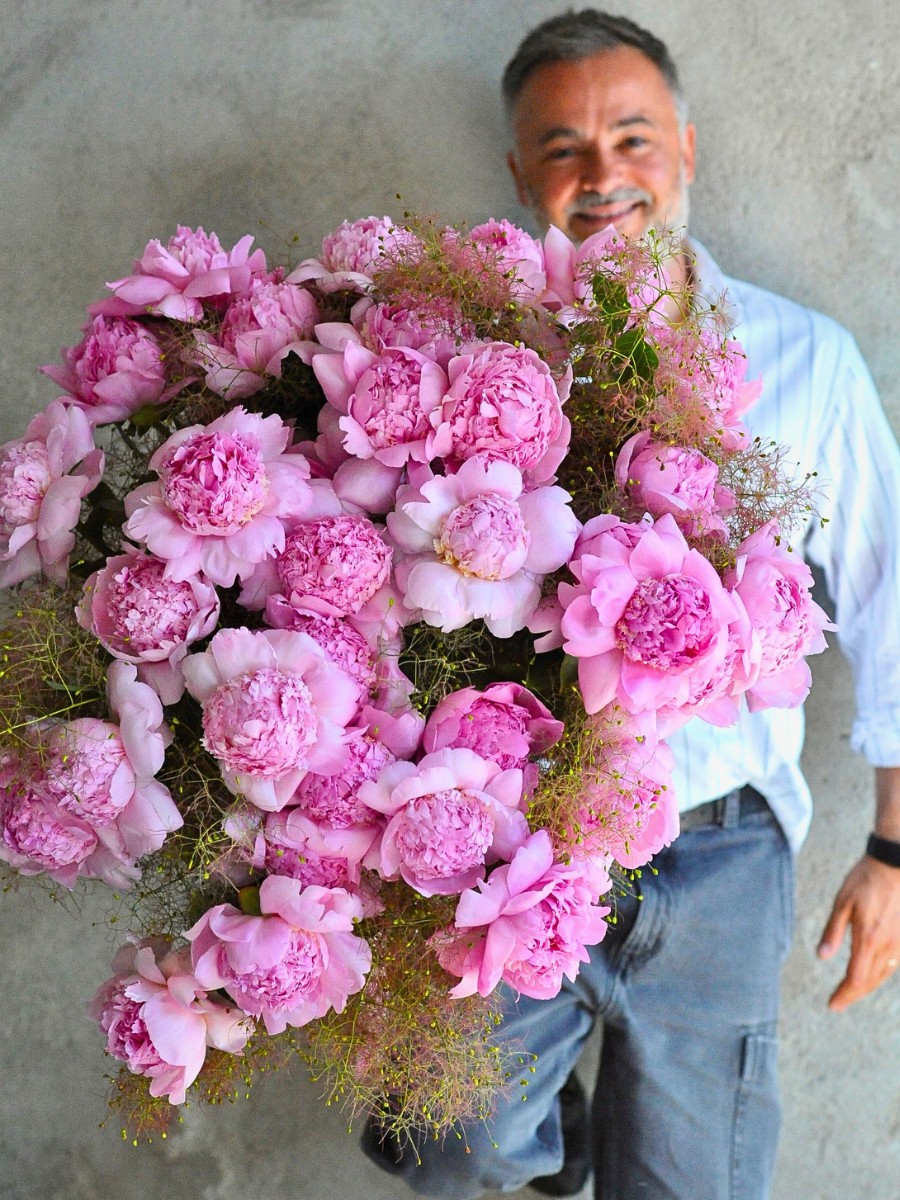 Nicu Bocancea With a Peonies Bouquet