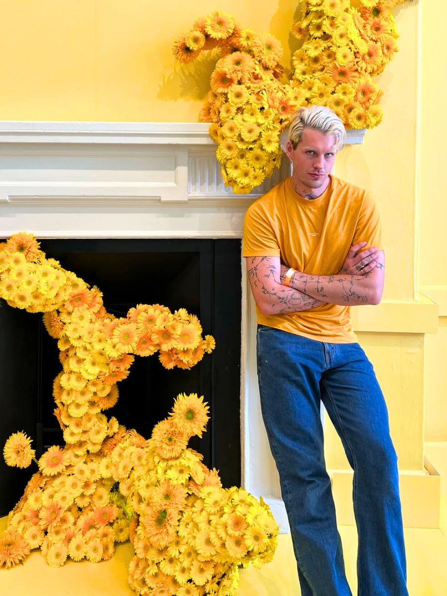 Hamish Powell among yellow gerberas