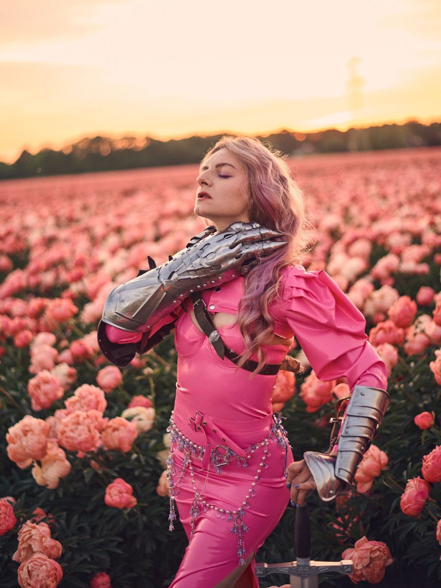 Anna Psy in a pink latex suit Anna Psy in a pink latex suit