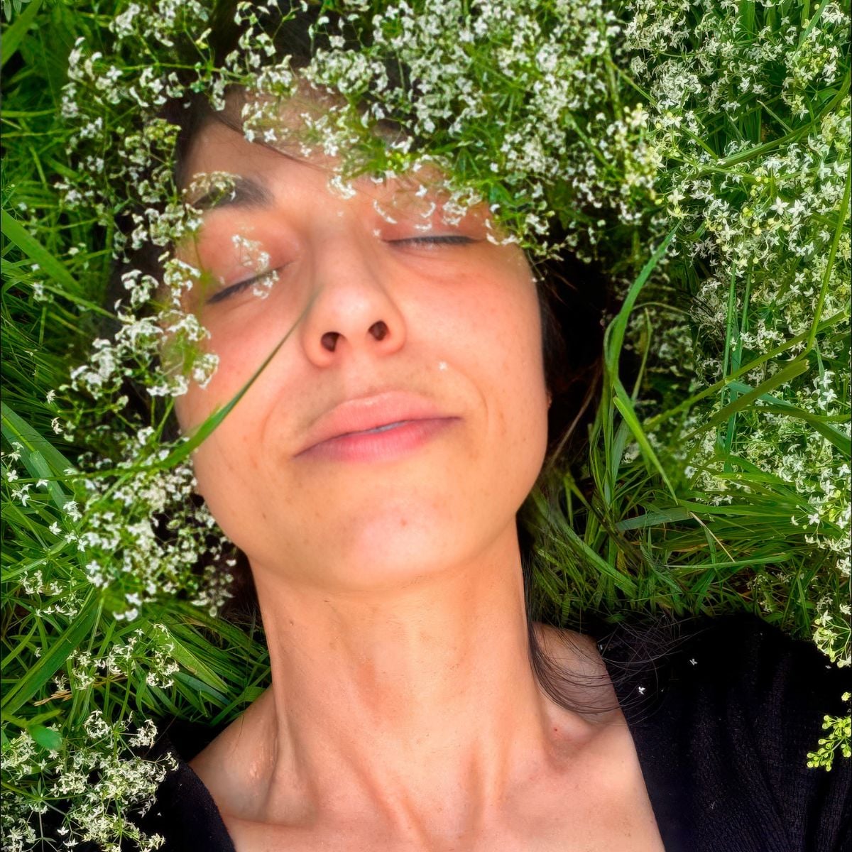 Woman laying in the grass