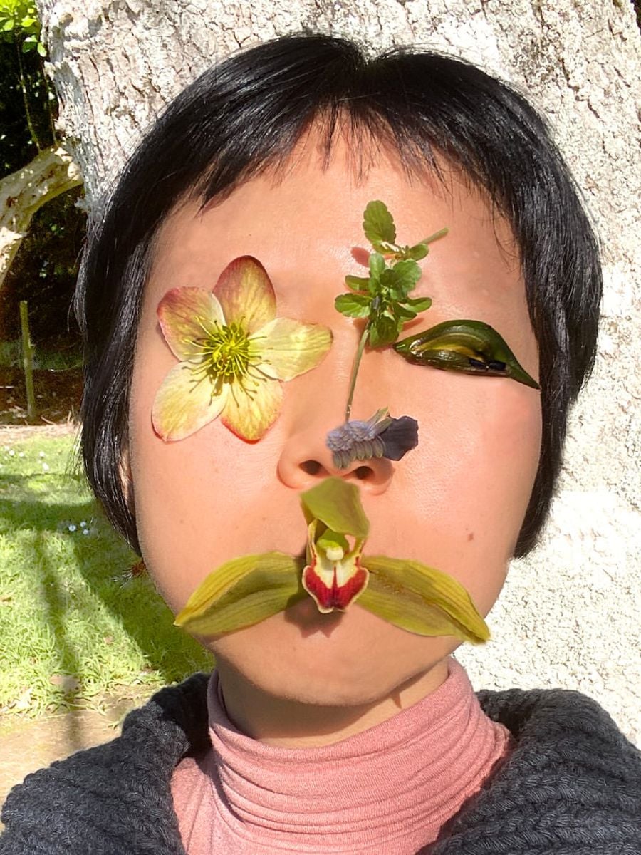 A floral face outside in the sun