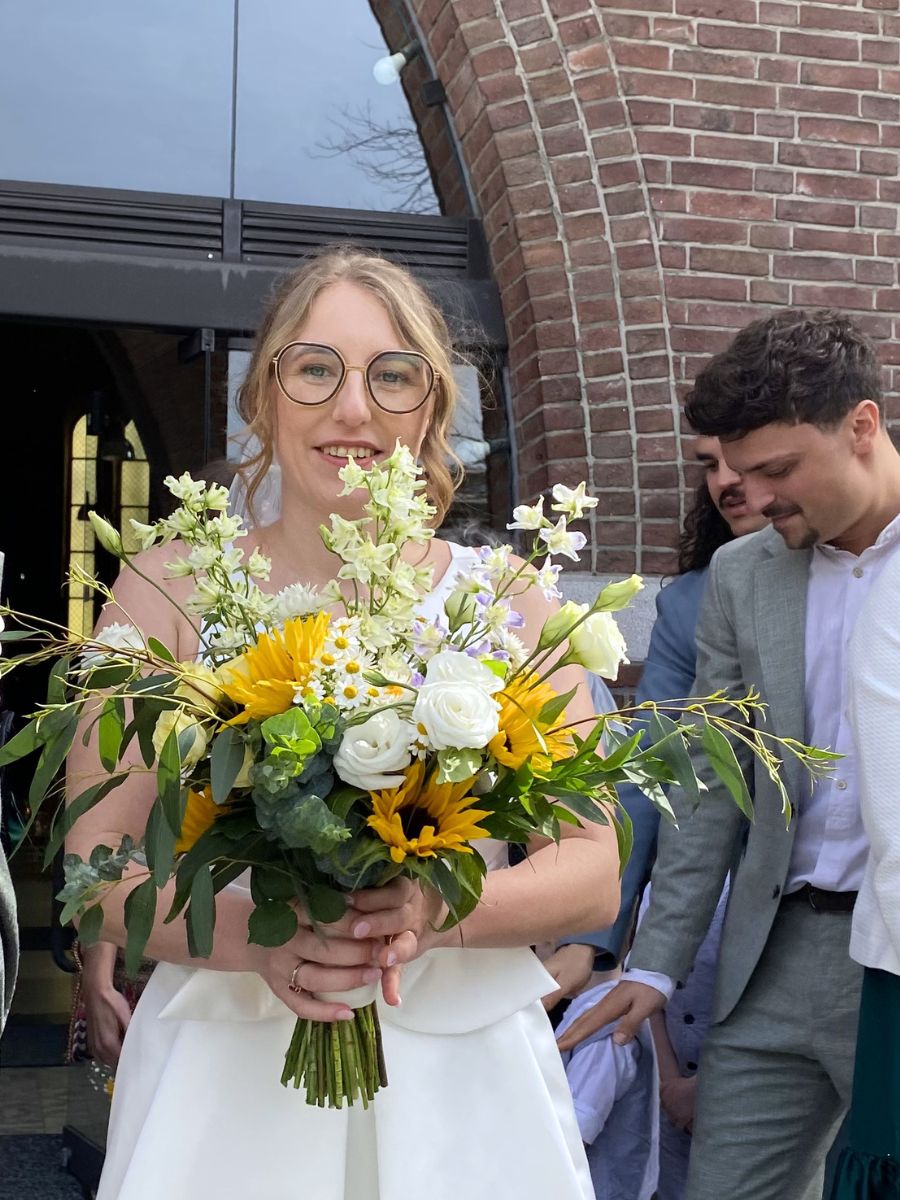 Margo and Her Wedding Flowers With Sunflowers