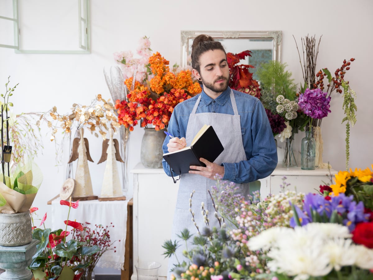 Men work on their own flower business