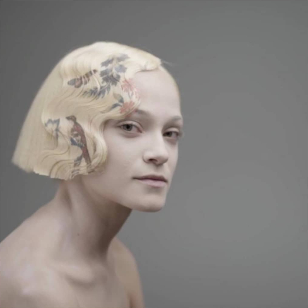 Model shows floral motifs printed on blonde hair on Thursd