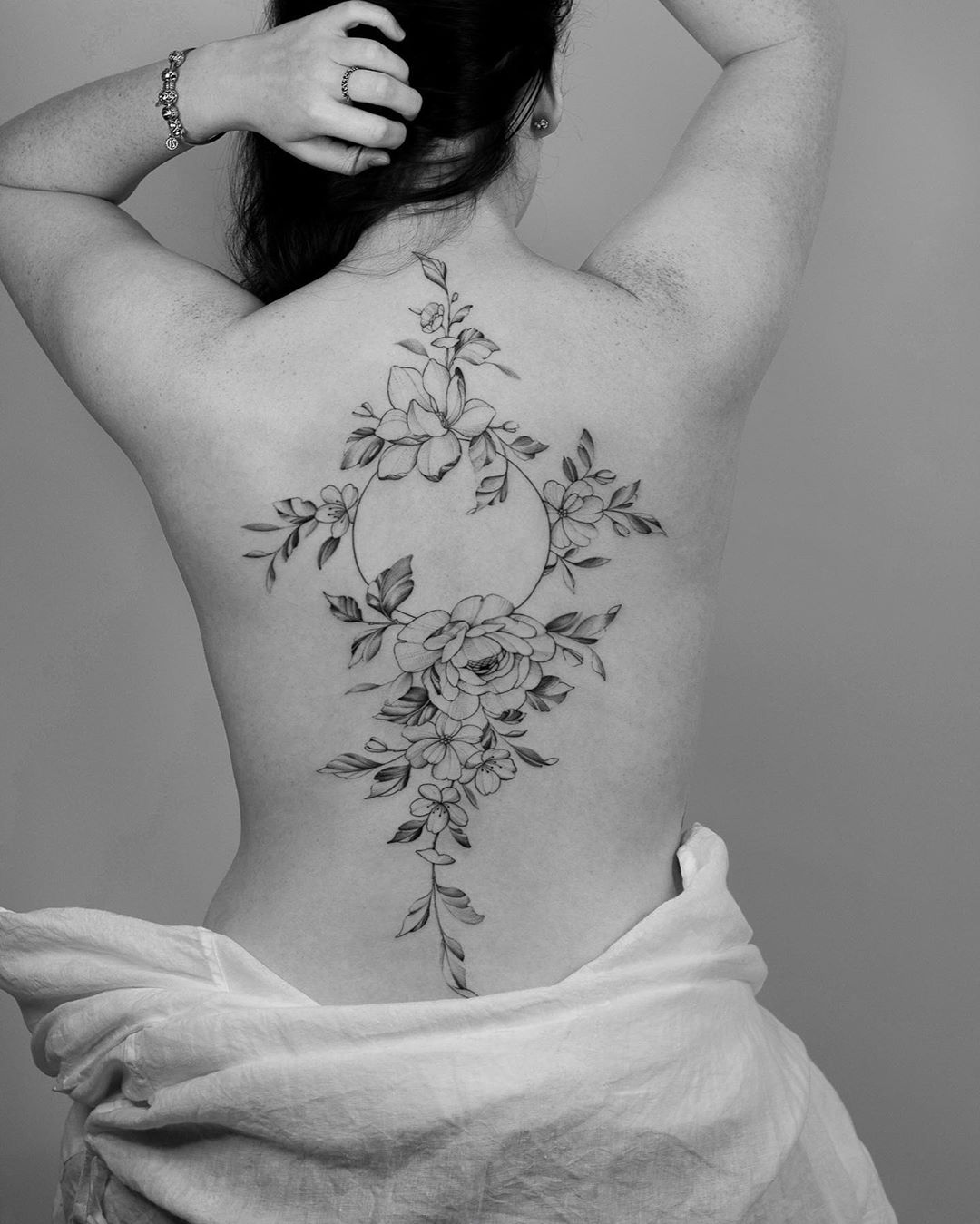Flowering flowers back tattoo by Yojo Grim (Joohyun Jo): TattooNOW