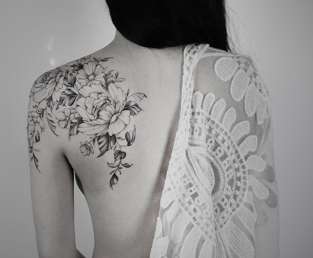 Hannah Nova Black Tattoo on back