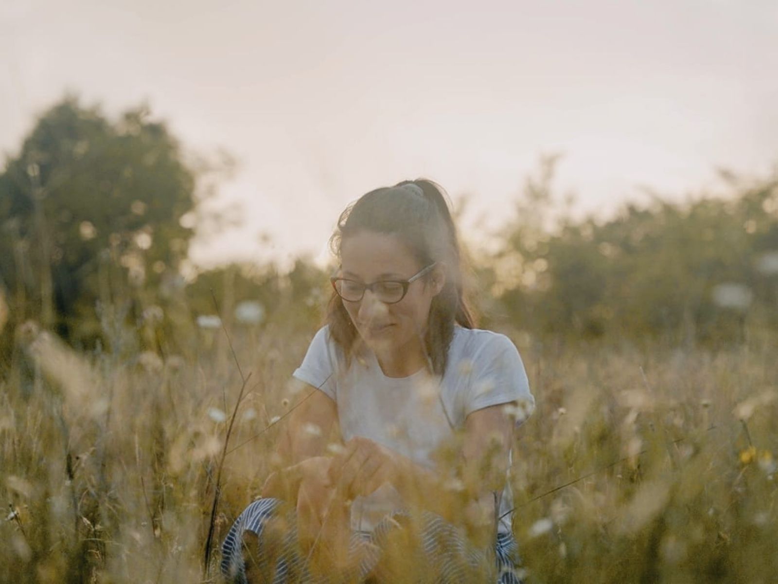 Woman in savanna grass