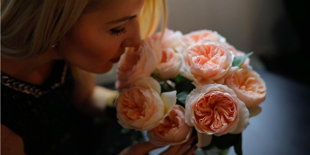 Floral designer Alina Neacsa smelling the roses scented flowers on Thursd