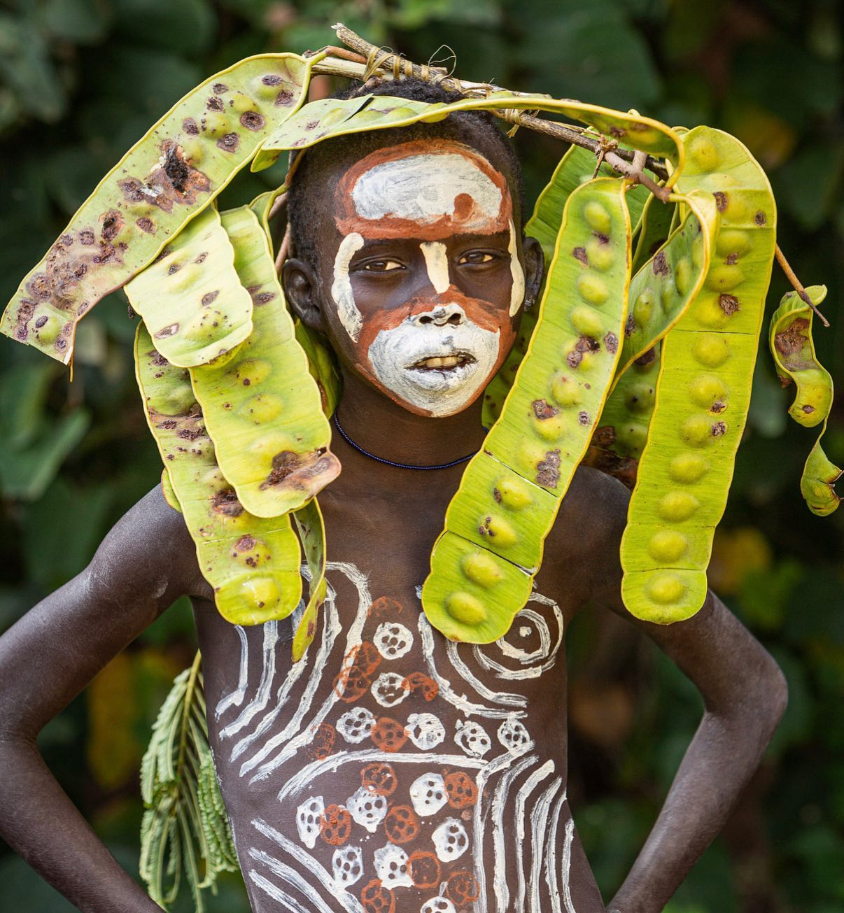 People From the Ethiopian Suri Tribe Wear Intricate Face Paint and Don B...