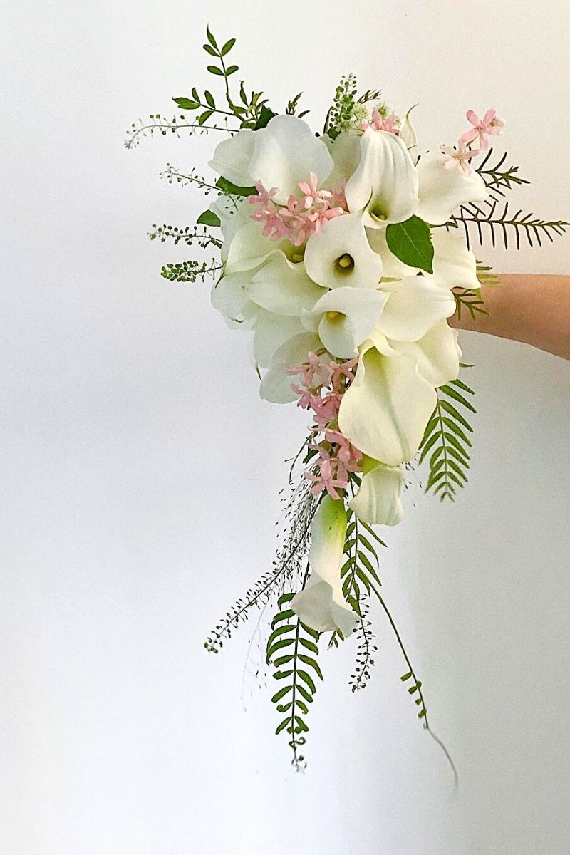 Cascading White Calla Arrangement- on Thursd