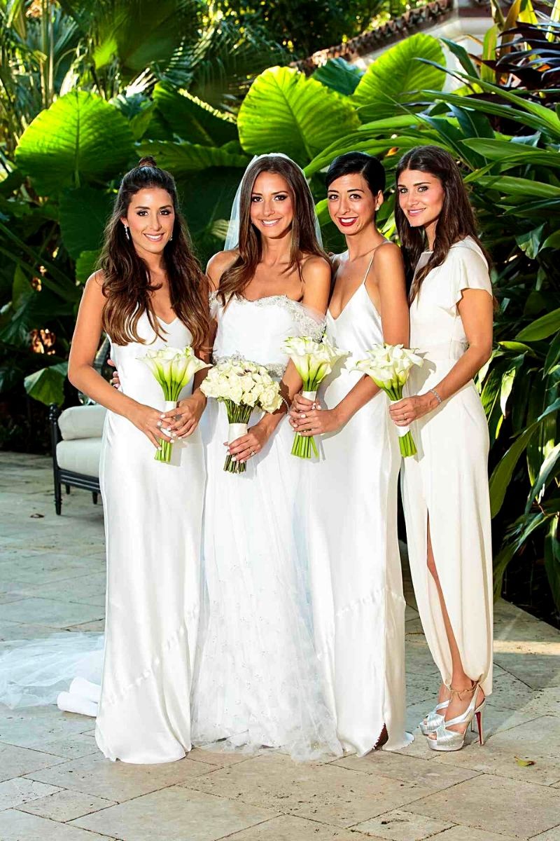 Bridesmaids bouquets made of white calla- on Thursd