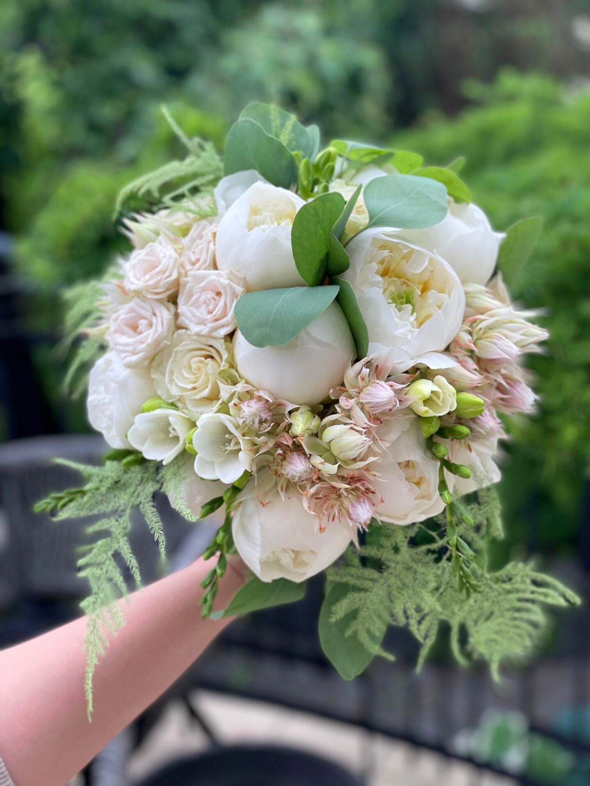 Blushing Bride and Peonies on the Rooftop of a Church to Celebrate the P