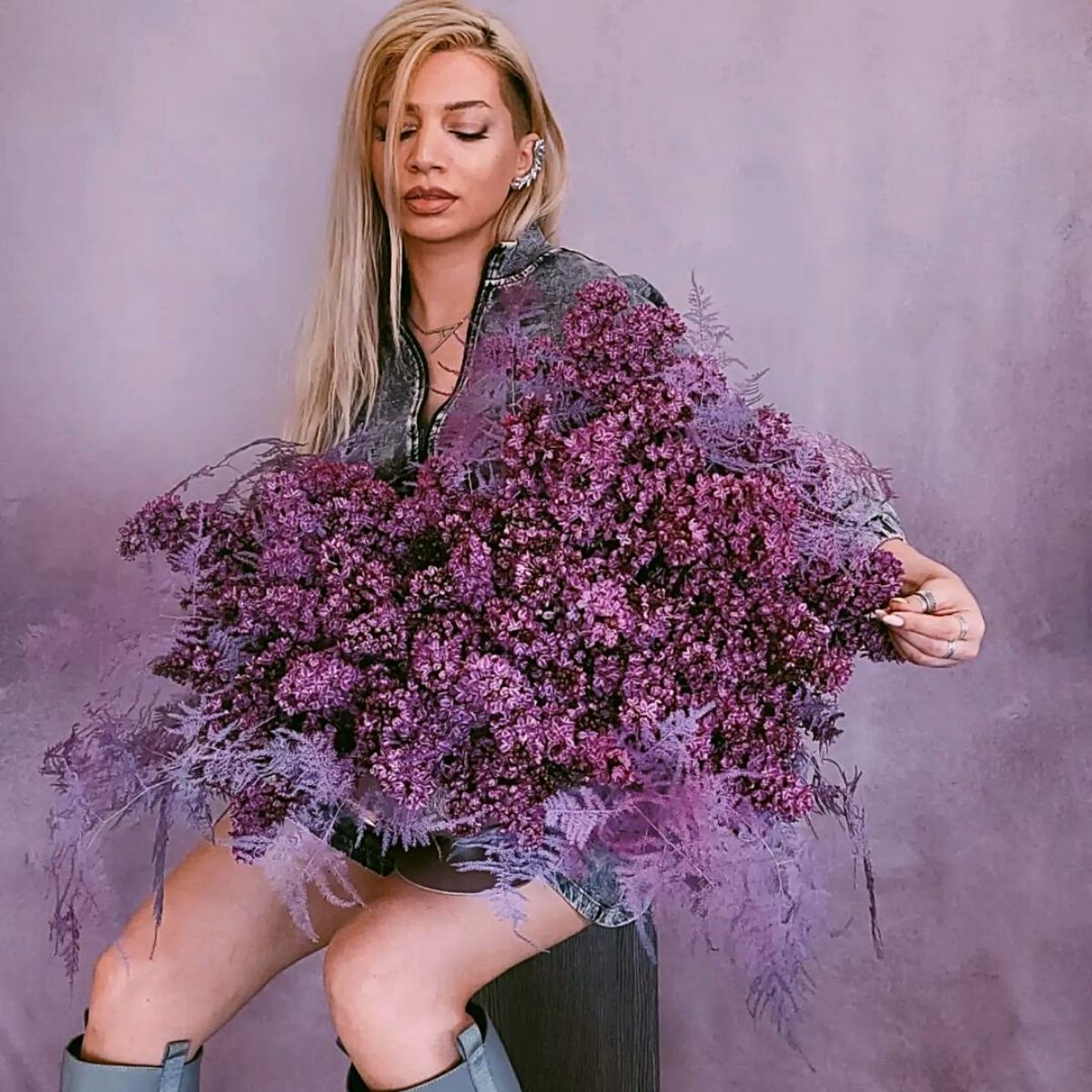 Araks Sarkisyan with her purple bouquet on Thursd
