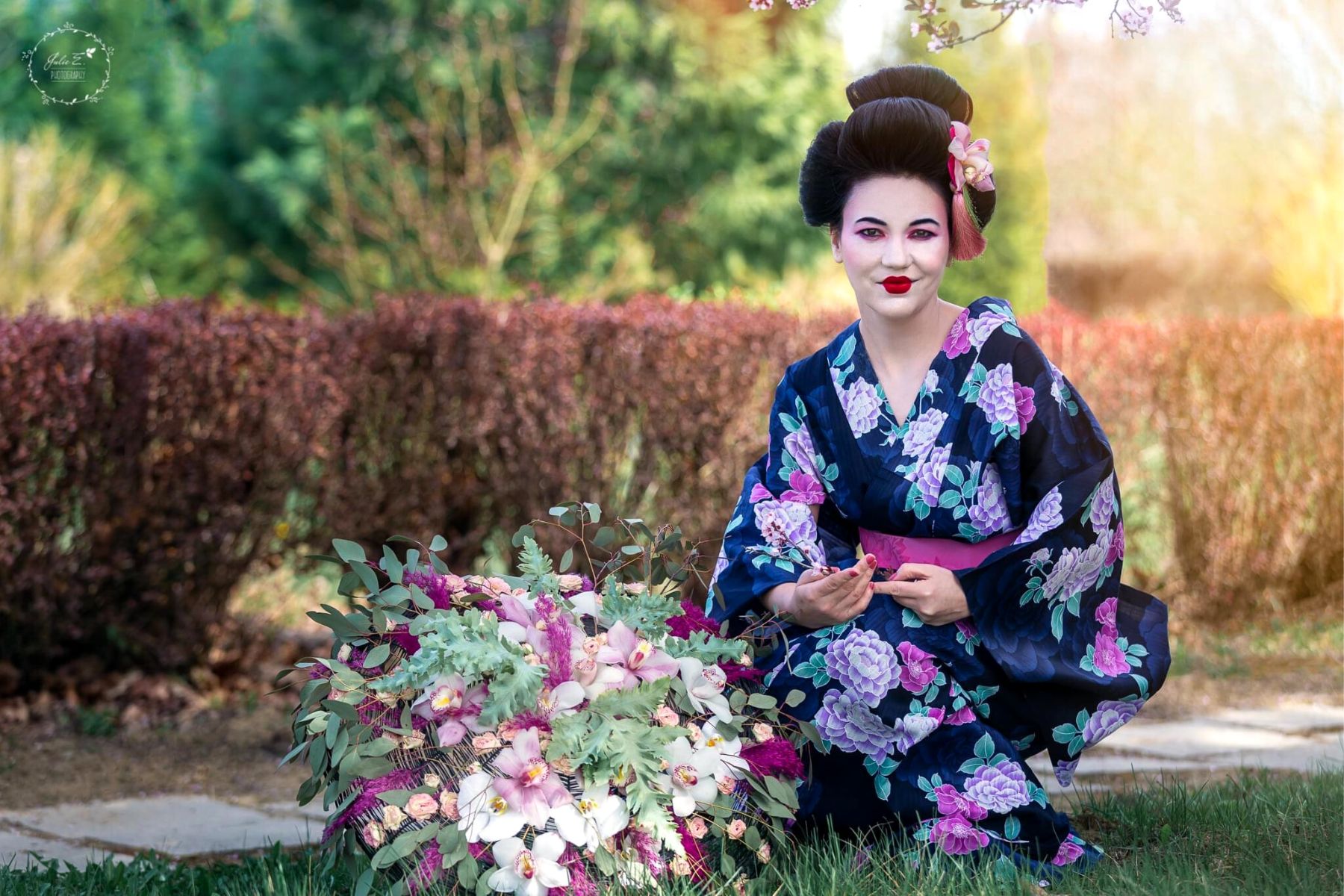 Geisha Adorned With a Flowered Umbrella and Floral Hair Jewelry - Blog o